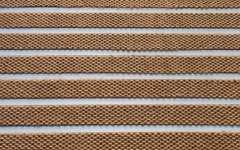Close up image of Camel Superguard inserts in Aluminium Architecture Matting - Made to Measure