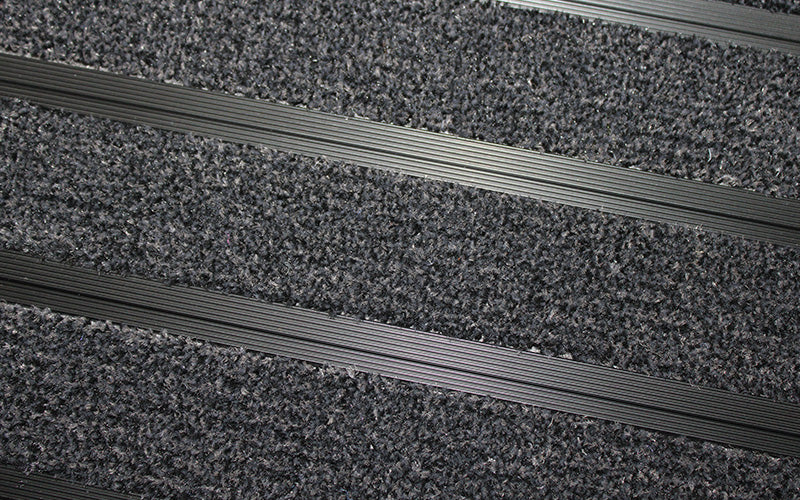 Close up image of Black Granati inserts in Black ARCHIMAT aluminium architectural matting