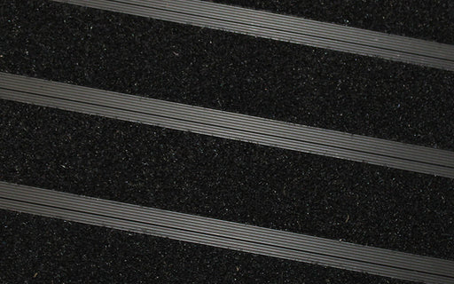 Close up image of Black Metro inserts in Black ARCHIMAT aluminium architectural matting