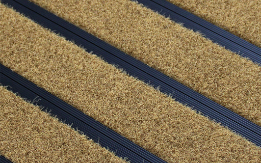 Close up image of Brown Metro inserts in Black ARCHIMAT aluminium architectural matting