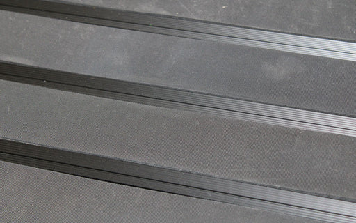 Close up image of Ply Insertion Rubber inserts in Black ARCHIMAT aluminium architectural matting