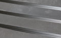 Close up image of Ply Insertion Rubber inserts in Black ARCHIMAT aluminium architectural matting