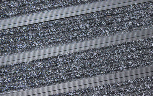Close up image of Super Brush inserts in Black ARCHIMAT aluminium architectural matting