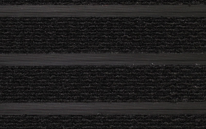 Close up image of Black Superguard inserts in Black ARCHIMAT aluminium architectural matting