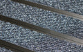 Close up image of Denim Superguard inserts in Black ARCHIMAT aluminium architectural matting