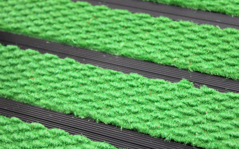 Close up image of Kelly Green Superguard inserts in Black ARCHIMAT aluminium architectural matting
