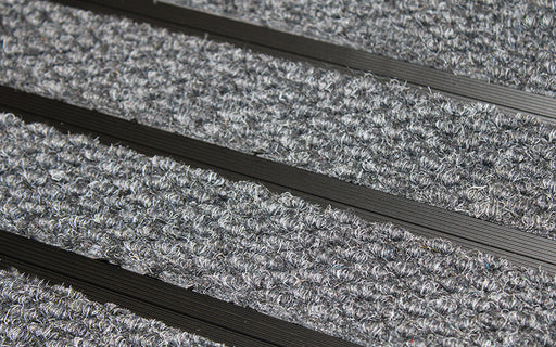 Close up image of Mid Grey Superguard inserts in Black ARCHIMAT aluminium architectural matting
