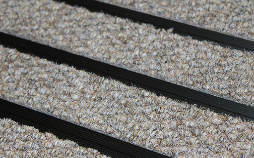 Close up image of Natural Beige Superguard inserts in Black ARCHIMAT aluminium architectural matting