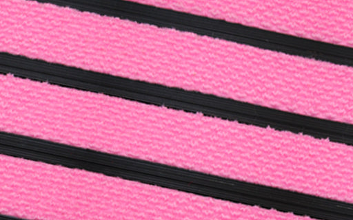 Close up image of Pink Superguard inserts in Black ARCHIMAT aluminium architectural matting