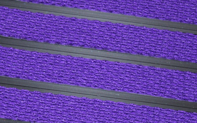 Close up image of Purple Superguard inserts in Black ARCHIMAT aluminium architectural matting