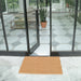 Insitu product image of natural coir matting at modern home entrance