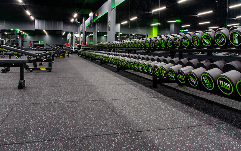 Insitu product image of our rubber black with light grey flecked gym mats in a commercial gym set up 