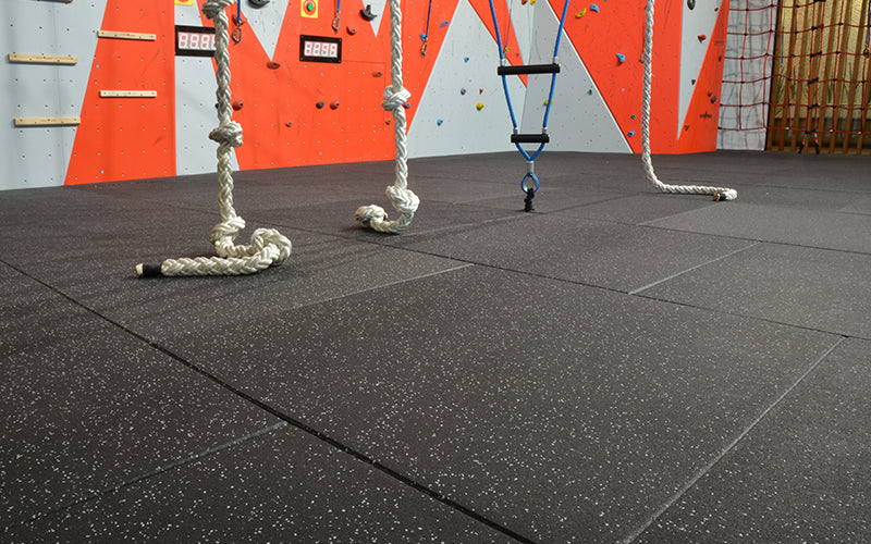 Insitu product image of our rubber black with light grey flecked gym mats in a commercial gym set up