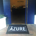 Insitu product image of black Dirtstopper Logo Mat with one colour print at office entrance