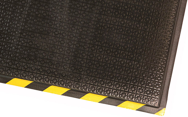 Corner product image of black nitrile rubber Happy Feet Texture Top Mat with safety border
