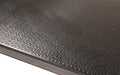 Close up product image of edge of black nitrile rubber Happy Feet Texture Top Mat