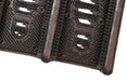 Corner product image of black rubber Mud Chucker that scrapes mud off shoes
