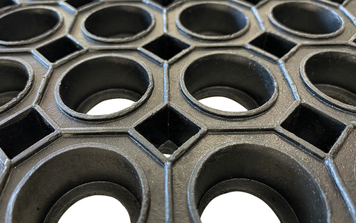 Close up product image of Oct-O-Mat used for areas requiring heavy duty drainage and is made from a natural rubber compound