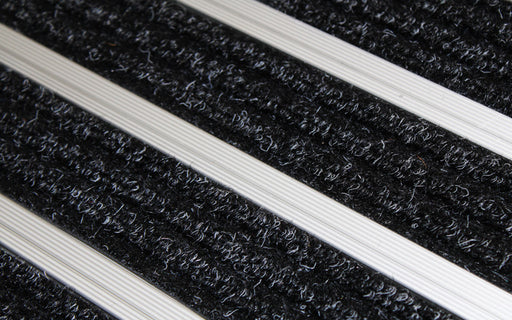 Close up image of Super Brush inserts in Silver ARCHIMAT aluminium architectural matting