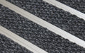Close up image of Mid Grey Superguard inserts in Silver ARCHIMAT aluminium architectural matting