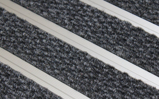 Close up image of Mid Grey Superguard inserts in Silver ARCHIMAT aluminium architectural matting