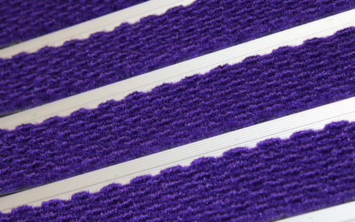 Close up image of Purple Superguard inserts in Silver ARCHIMAT aluminium architectural matting