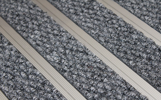 Close up image of Sterling Superguard inserts in Silver ARCHIMAT aluminium architectural matting