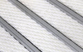 Close up image of White Superguard inserts in Silver ARCHIMAT aluminium architectural matting