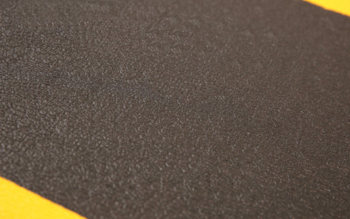 Close up product image of black and yellow, anti-fatigue Safety Cushion Mat