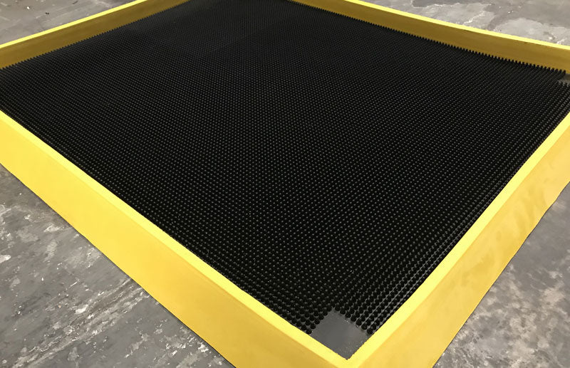 Insitu product image of rubber, black and yellow Sanitising Foot Bath used to disinfect shoes