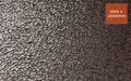 Close up product image of black rubber stable mat with bark surface