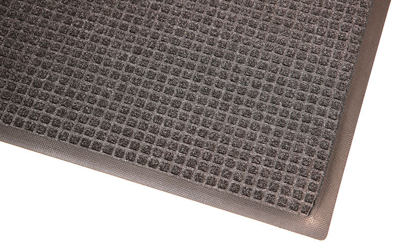 Corner product image of charcoal, polypropylene Waterhog Classic Mat made for commercial and residential entrances