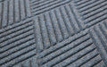 Close up product image of bluestone, polypropylene Waterhog Eco Premier Mat made for commercial and residential entrances