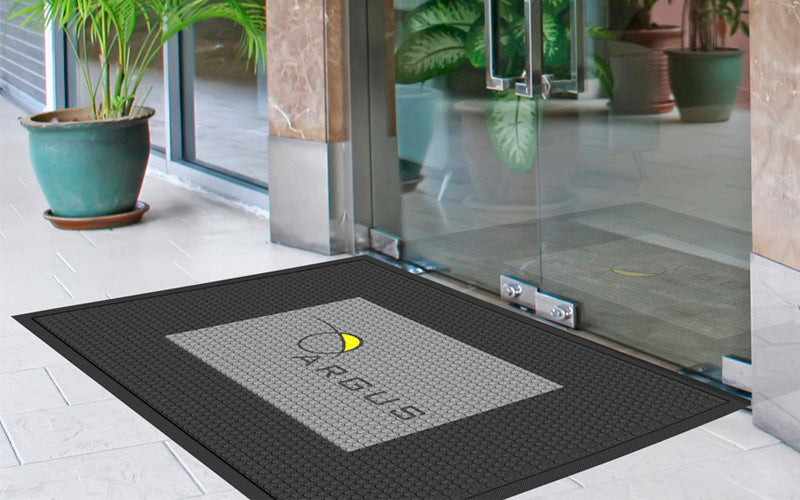 Insitu image of a Rubber Scraper Logo Mat used in an entraceway outside.