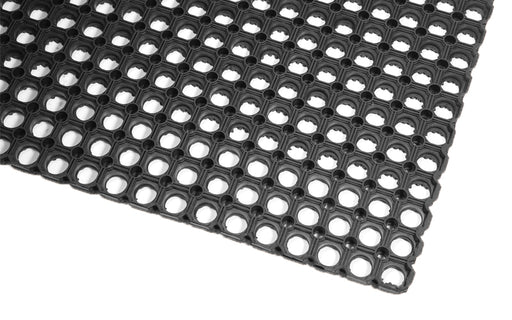 Corner product image of the Honeycomb heavy duty drainage mat which is perfect for wet areas.