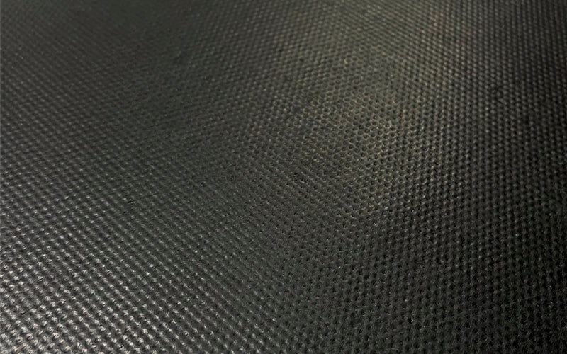 Close up of the textured latex backing.