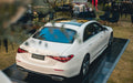 Insitu image of a car display outside with a promodek underneath.