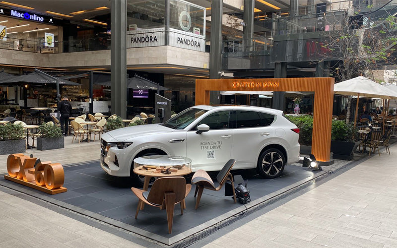 Insitu image of the promodek used for an outdoor car display at a shopping centre.