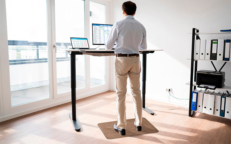 Insitu image of the tough comfort standing desk mat which is perfect for standing desks either in the office or at home as it has anti-fatigue properties.