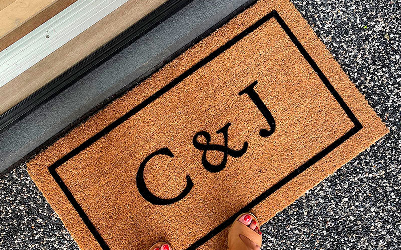 Insitu image of personalised Couple Initials Doormat