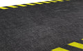Close up product image of non-slip, black and yellow Smartgrip Industrial Matting Roll