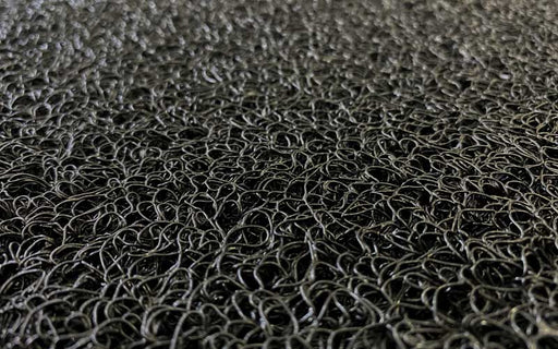 Close up product image of black Spiral Loop Mat made of Vinyl with PVC Backing