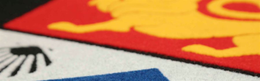 Close up of a custom printed logo mat in full colour